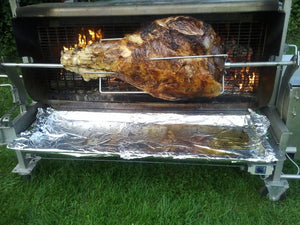 Rotisserie Whole Steamship of Beef. Flame Show Cooking Catering or Drop Off Catering