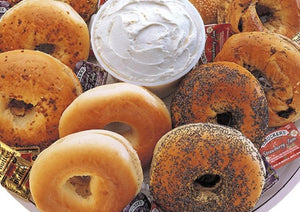 BREAKFASR BASKET  Assortment of fresh baked bagels served with butter, cream cheese and preserves